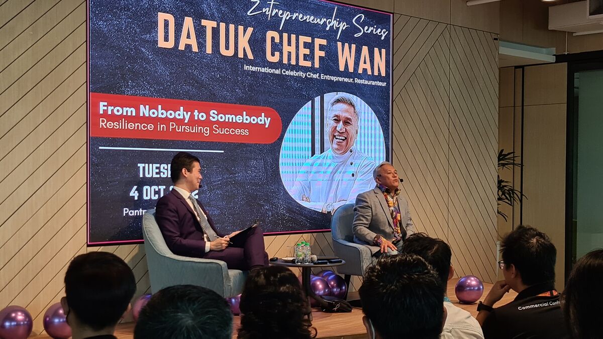 Michael Teoh moderating a live stage conversation with Chef Wan